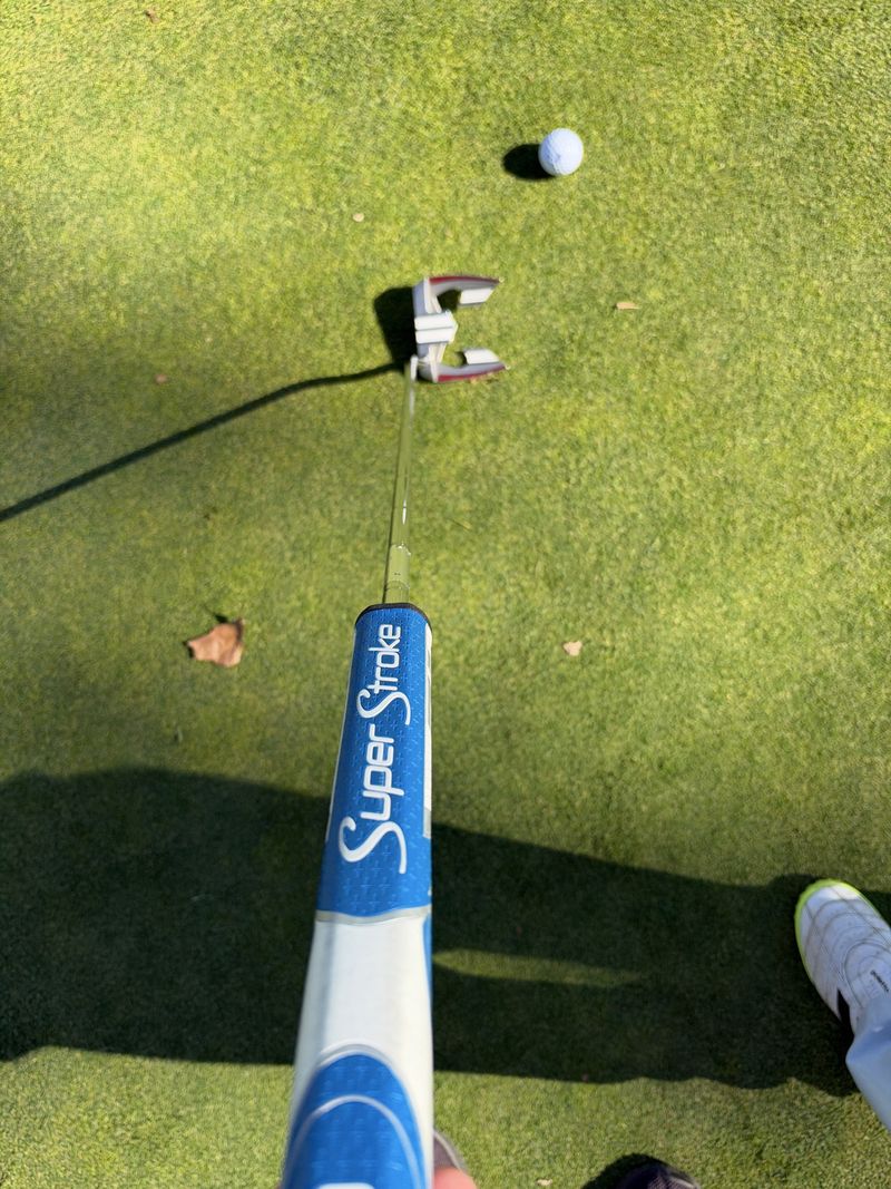 Odyssey White Hot XG Teron putter at address, viewed from above